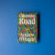 Caledonian Road by Andrew O'Hagan (hardcover) on a blue background)