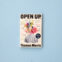 Paperback of Open Up by Thomas Morris on a blue background